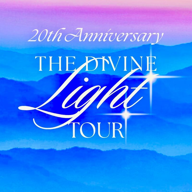20th Anniversary The Divine Light Tour above blue mountains
